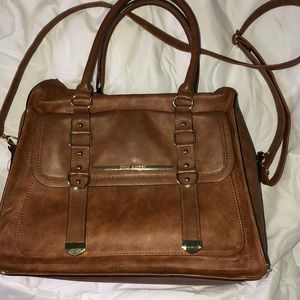 Roomy crossover messenger bag by Steve Madden.